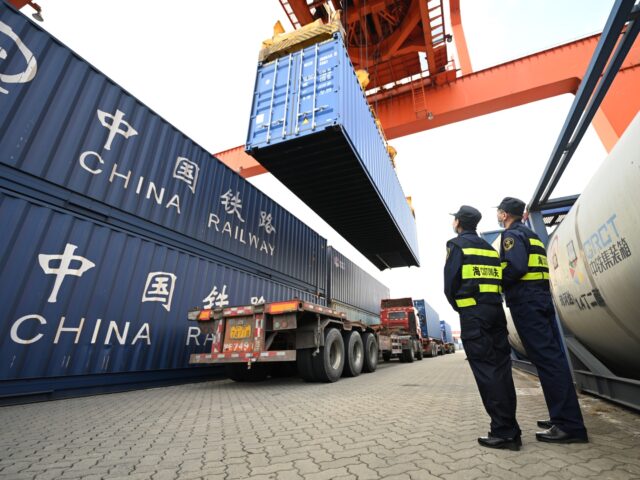 SHANGHAI, CHINA - OCTOBER 29: Customs staff check the China-Europe Railway Express trains
