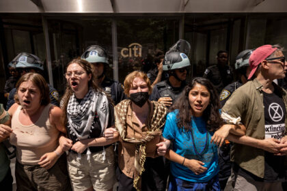 Activists block the entrance of the Citigroup Inc. headquarters during a protest in New Yo