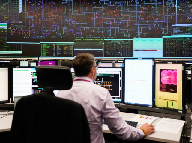 A worker in the National Grid control room in Sindlesham, Berkshire as the Electricity Sys
