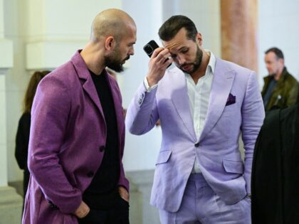Andrew Tate (L) and his brother Tristan Tate are pictured inside The Court of Appeal in Bu