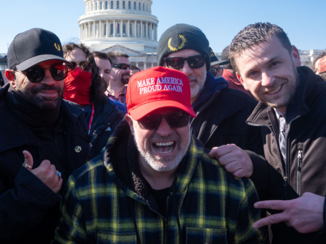 GettyImages-2201275663 Washington, United States - February 21 : From left to right are Stewart Rhodes, former Pr