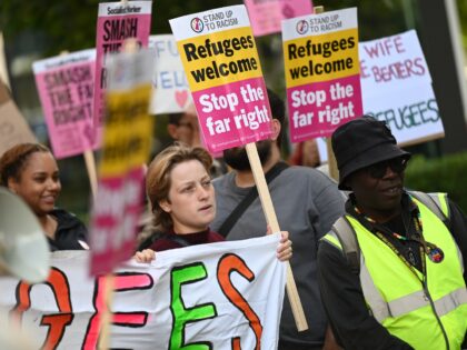 LONDON, UNITED KINGDOM - AUGUST 31: Pro-migrant and anti-fascist protesters gather outside