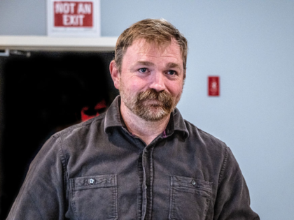 PORTLAND, MAINE - JUNE 07: Democratic U.S. Senate candidate Graham Platner speaks to voter