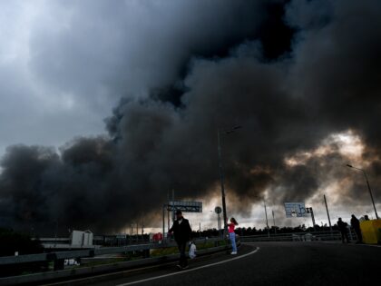 MOSCOW, RUSSIA - JUNE 18: Black smoke rises from the refinery where a fire broke out follo
