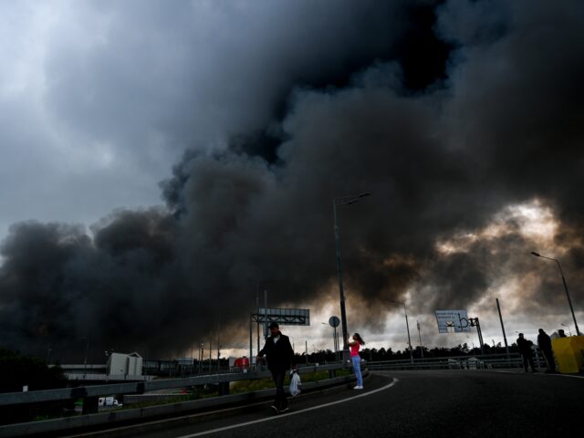 MOSCOW, RUSSIA - JUNE 18: Black smoke rises from the refinery where a fire broke out follo