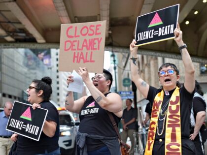 NEW YORK, UNITED STATES - JUNE 26: People stage a sit-in on 42nd Street near Grand Central