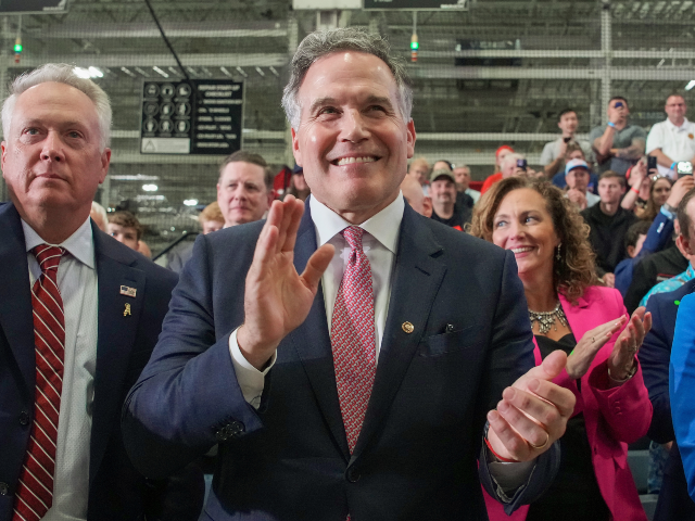 GettyImages-2282985524 MACUNGIE, PENNSYLVANIA - JUNE 23: (L-R) President of Mack Trucks Stephen Roy, U.S. Sen. Da