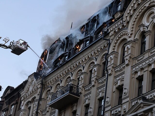 KYIV, UKRAINE - JULY 2: Firefighters extinguish a fire at the City hotel residence after a