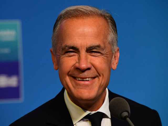 Canada's Prime Minister Mark Carney speaks during doorstep statements within the annual NA