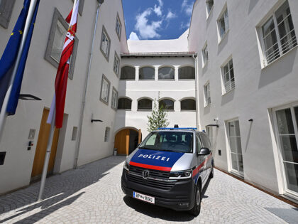 Picture taken on July 16, 2026 shows a police car standing in a courtyard of the birth hou