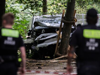 BERLIN, GERMANY - JULY 26: German police stand near a white van that suspect Abdul B. used