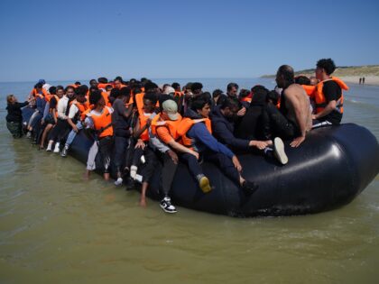 People thought to be migrants on board a small boat off the coast of Hardelot, France, dur