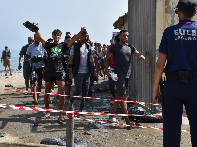 CEUTA, SPAIN - JULY 30: Several people are crossing the border on 30 July 2026 in Ceuta, S