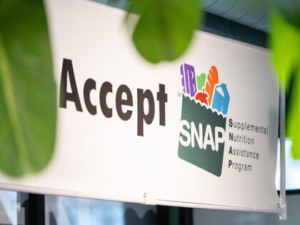 Supplemental Nutritional Assistance Program (SNAP) signage at a grocery store in Dorcheste