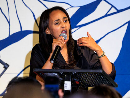 Democratic congressional candidate Melat Kiros speaks to supporters at an election-night w