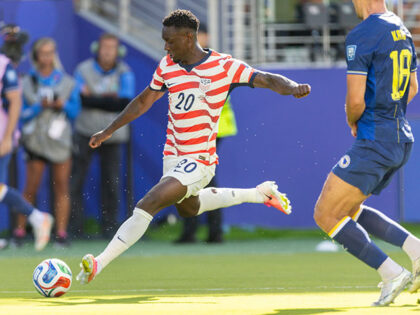 Folarin Balogun #20 of United States of America crosses the ball during the FIFA World Cup
