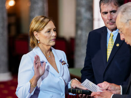 Senator Darline Graham Nordone, a Republican from South Carolina, from left, her husband L