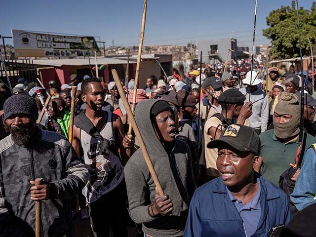 Protesters march during a demonstration against illegal immigration in Johannesburg, South
