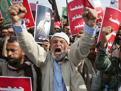 Yemeni protesters take part in a demonstration held to send a message of defiance against