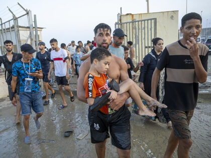 Hundreds of migrants have attempted to swim from Morocco to the Spanish city of Ceuta in N