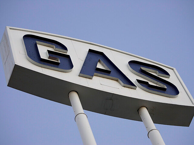 A sign marked "GAS" advertises a roadside gas station near Freeway 14 in California. (Phot