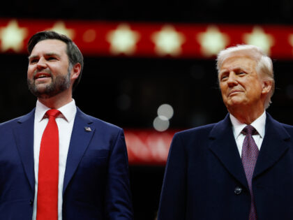 U.S. Vice President J.D. Vance and U.S. President Donald Trump watch during an indoor inau