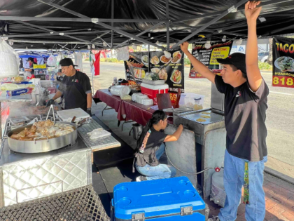 “Joe,” a worker, and his teenage son prepare for Saturday night customers in a massive