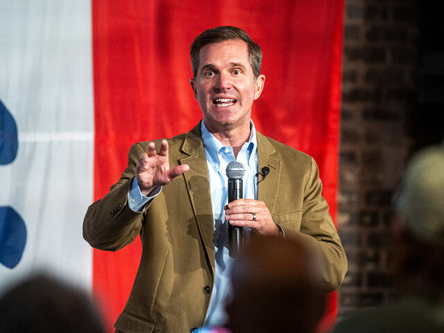 Andy Beshear, governor of Kentucky, speaks during a campaign event with Rob Sand, Democrat