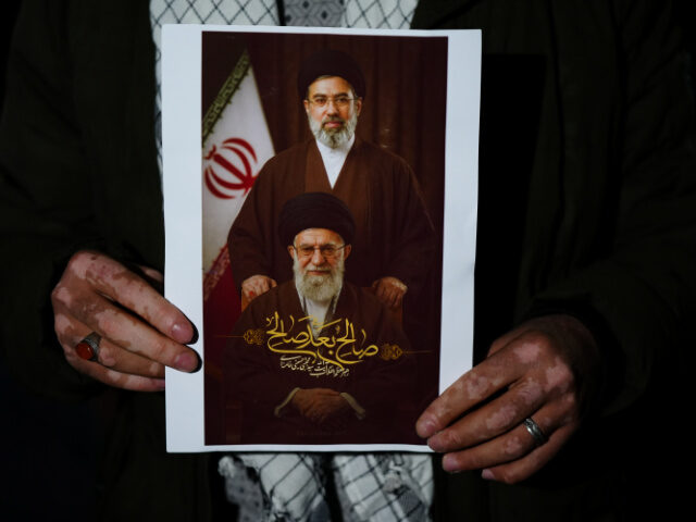 Khamenei and Son A group gathers to hold a support demonstration for Mojtaba Khamenei, who has become Iran&