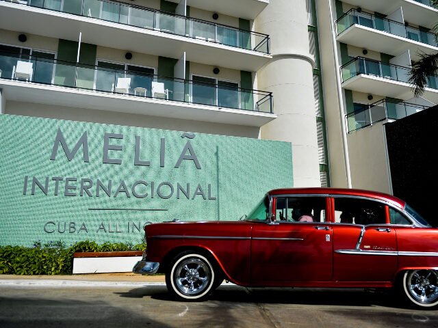 A car drives near the entrance of Melia International Hotel in Varadero, Matanzas Province