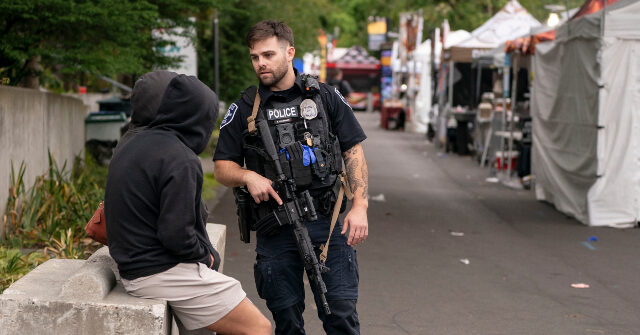 15-Year-Old Detained, Second Suspect Sought in Seattle Shootout