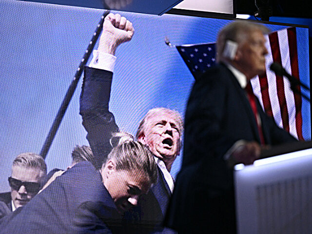 An image of US former President and 2024 Republican presidential candidate Donald Trump ra