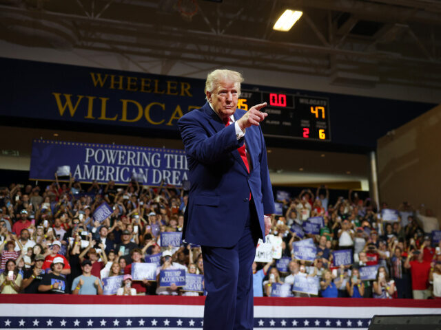 U.S. President Donald Trump arrives to speak at Wheeler High School on July 22, 2026 in Ma