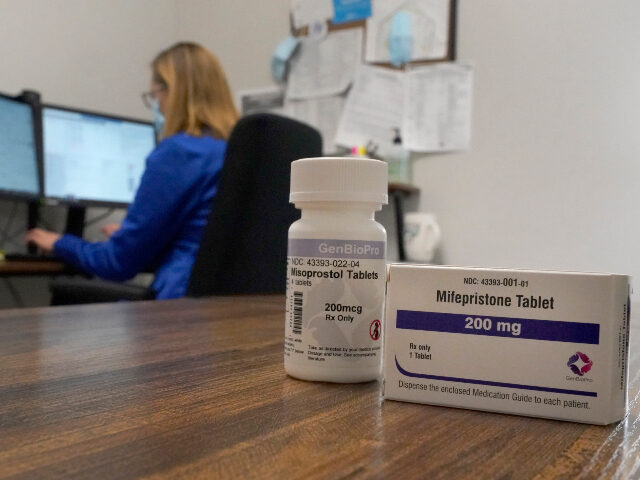 abortion pills via tele-health A Nurse Practitioner works in an office at a Planned Parenthood clinic where she confers v