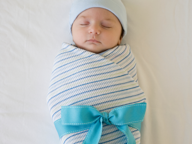 PHOTO: Couple Who Adopted Two Brothers Surprised with 'Miracle' Baby