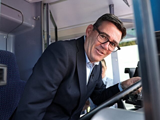 burnhan at home Britain's Prime Minister Andy Burnham is shown the driver's area on a FirstGroup bus at th