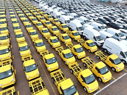 LIANYUNGANG, CHINA - JULY 14: Aerial view of cars waiting to be shipped aboard at Lianyung