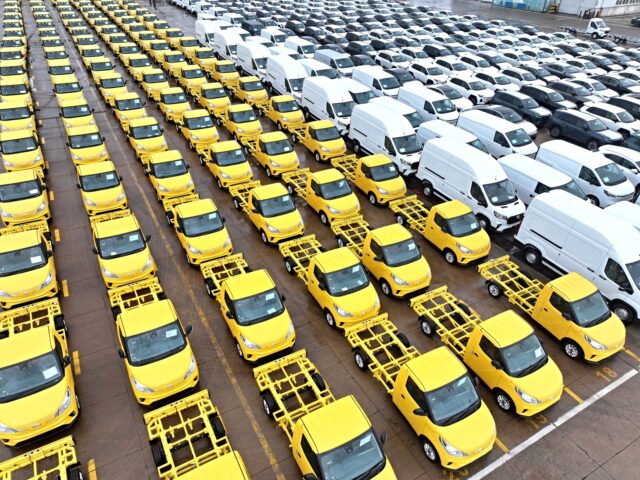 LIANYUNGANG, CHINA - JULY 14: Aerial view of cars waiting to be shipped aboard at Lianyung