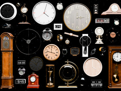 Variation of clocks over black background