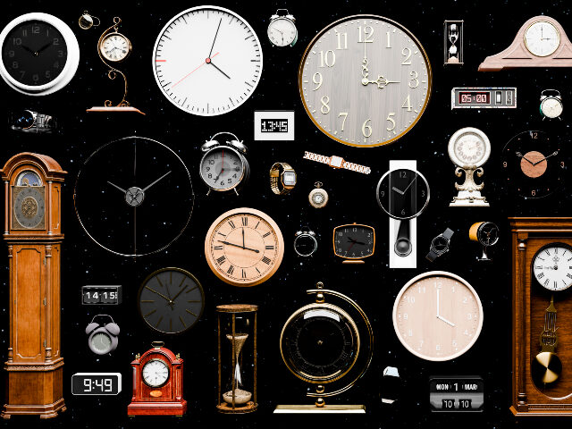 Variation of clocks over black background