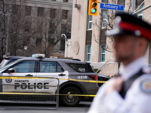 TORONTO, CANADA - MARCH 10 : A general view shows Toronto police securing the area after a