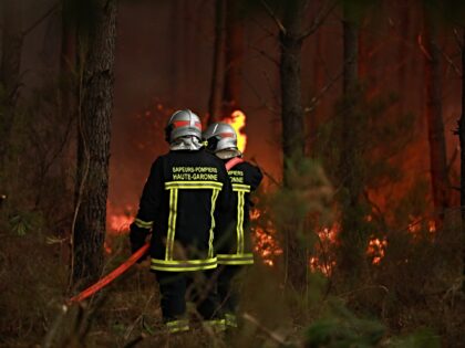SAINT-JEAN-D'ILLAC, FRANCE - JULY 26: Firefighting operations continue as a wildfire burns