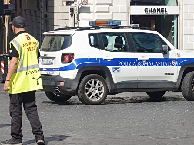 italian arrest A Rome Capital Police patrol vehicle is stationed near Piazza del Popolo in Rome, Italy, o