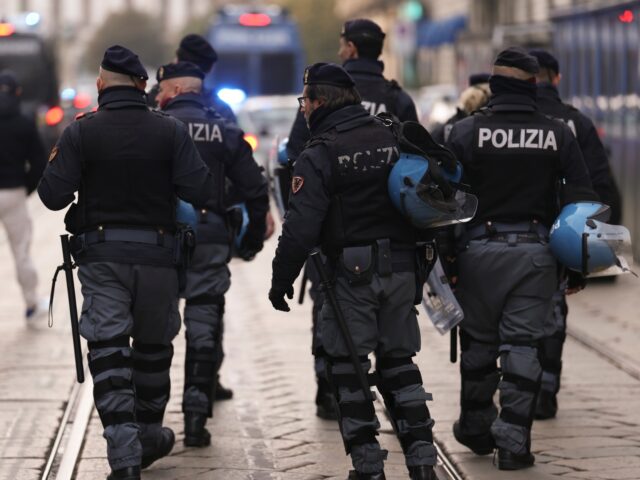 MILAN, ITALY - JANUARY 31: Police stands during a protest against deployment of ICE agents