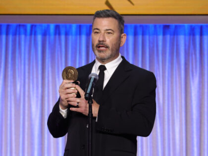 BEVERLY HILLS, CALIFORNIA - MAY 31: (L-R) Jimmy Kimmel accepts an award onstage during the