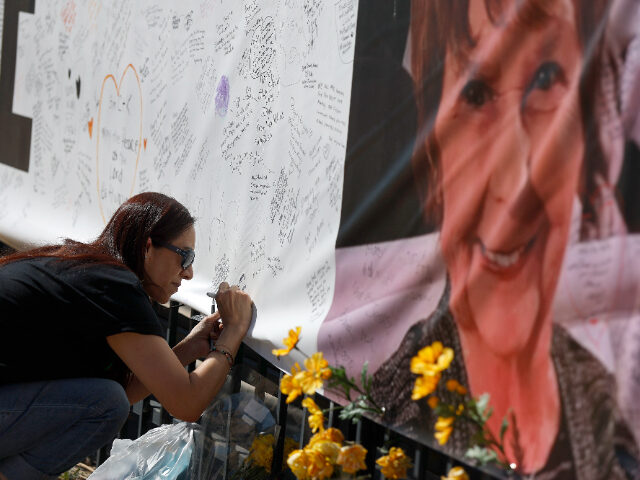 nancyguthrie TUCSON, ARIZONA - MARCH 03: Catalina Ochoa visits a memorial for Nancy Guthrie in front of