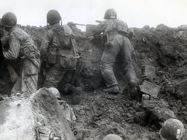 point-du-hoc-640x480 .S. Rangers firing from a bunker between Pointe du Hoc and Omaha Beach on June 7, 1944. D-