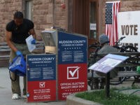 HOBOKEN, NJ - JUNE 4: A poll worker collects mail in ballots from a drop box for the New Jersey primary election on June 4, 2024, in Hoboken, New Jersey. (Photo by Gary Hershorn/Getty Images)