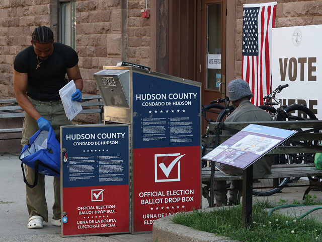 poll-worker-New-Jersey-primary-election-June4-2024-getty HOBOKEN, NJ - JUNE 4: A poll worker collects mail in ballots from a drop box for the New J