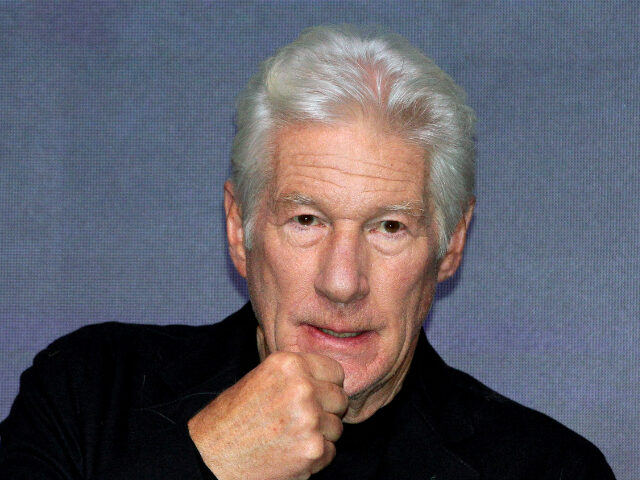 MEXICO CITY, MEXICO - DECEMBER 3: American actor Richard Gere touches his chin and attends